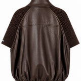 Veste effet cuir à empiècements tressés