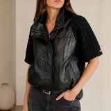 Veste effet cuir à empiècements tressés