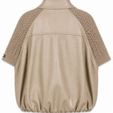 Veste effet cuir à empiècements tressés