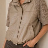 Veste effet cuir à empiècements tressés