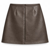 Jupe courte à boucle en simili cuir