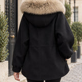 Veste à capuche bordée de fausse fourrure