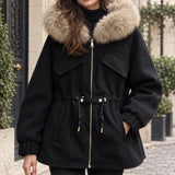 Veste à capuche bordée de fausse fourrure