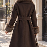 Veste ceinturée col fourrure